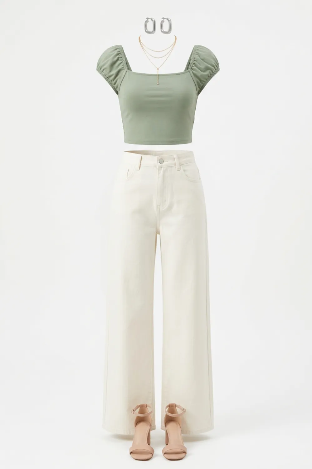 Flat lay of a sage puff-sleeve crop top, cream high-rise jeans and nude heeled sandals