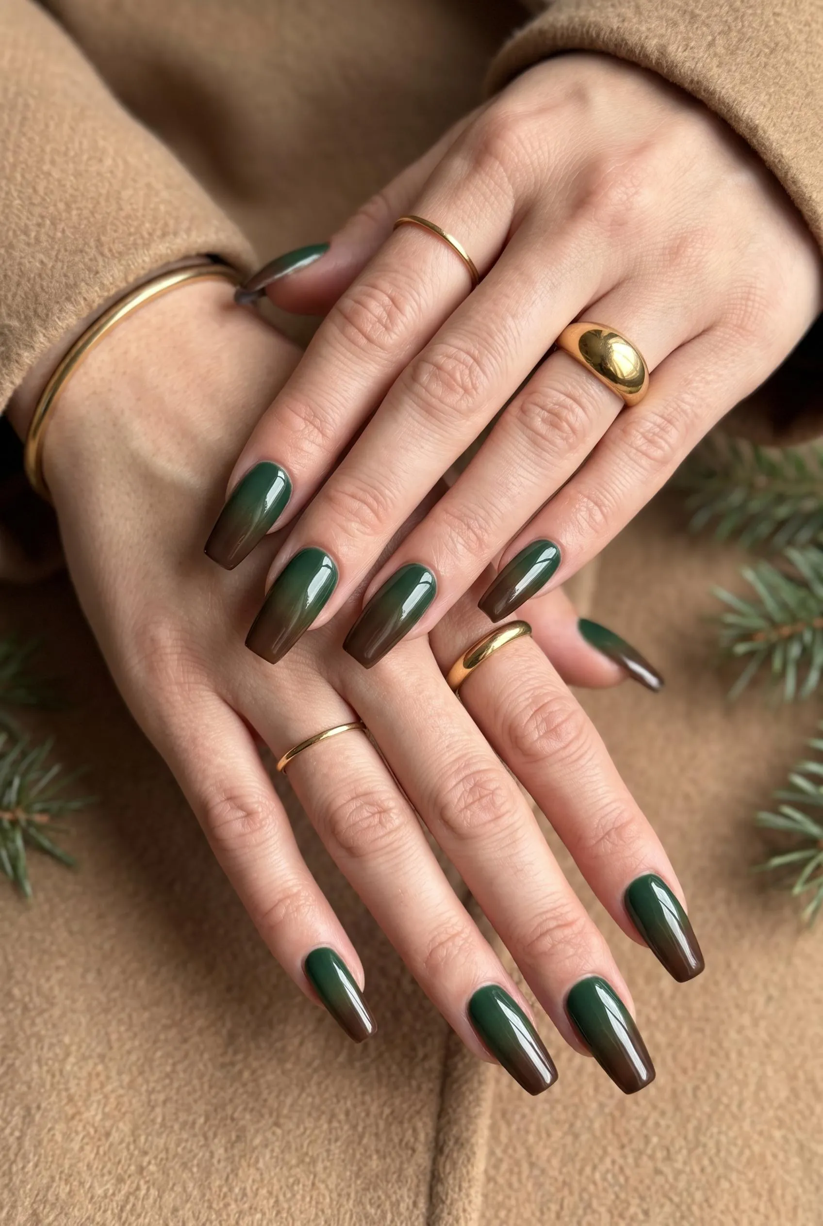Long coffin nails with a forest green to chocolate brown ombre