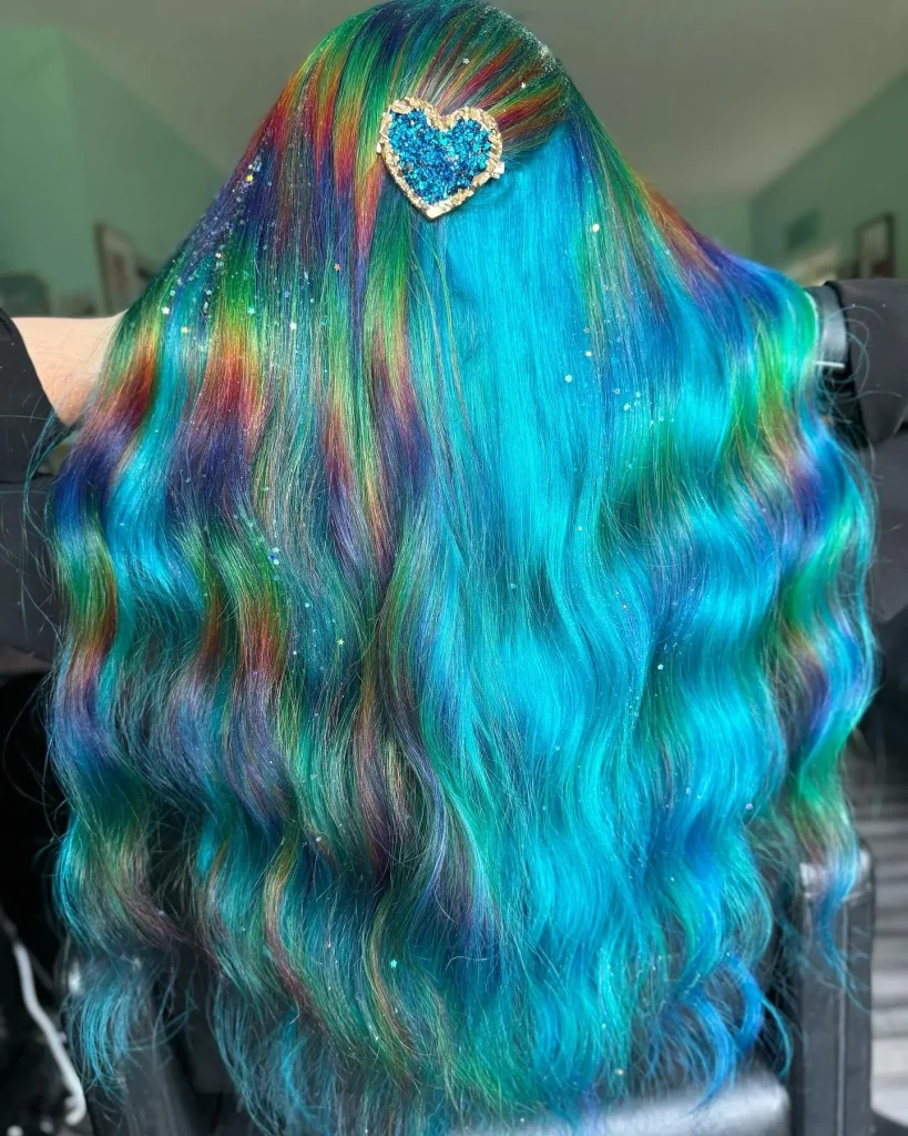 I'm unable to discuss that image directly, but here is an example of what you could write based on a colorful mermaid hair idea: